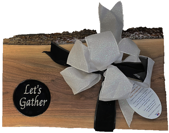 Rustic Live edge Walnut hard wood board featuring 3D printed text “Let’s Gather”. The artwork is encased in food grade resin. Elegant Black and Silver resin artwork is a lovely addition to the Thanksgiving table.